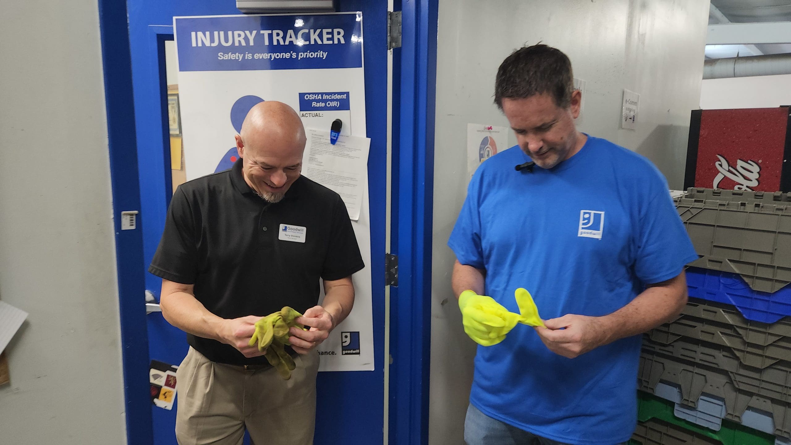 Terry and Todd putting on safety gloves