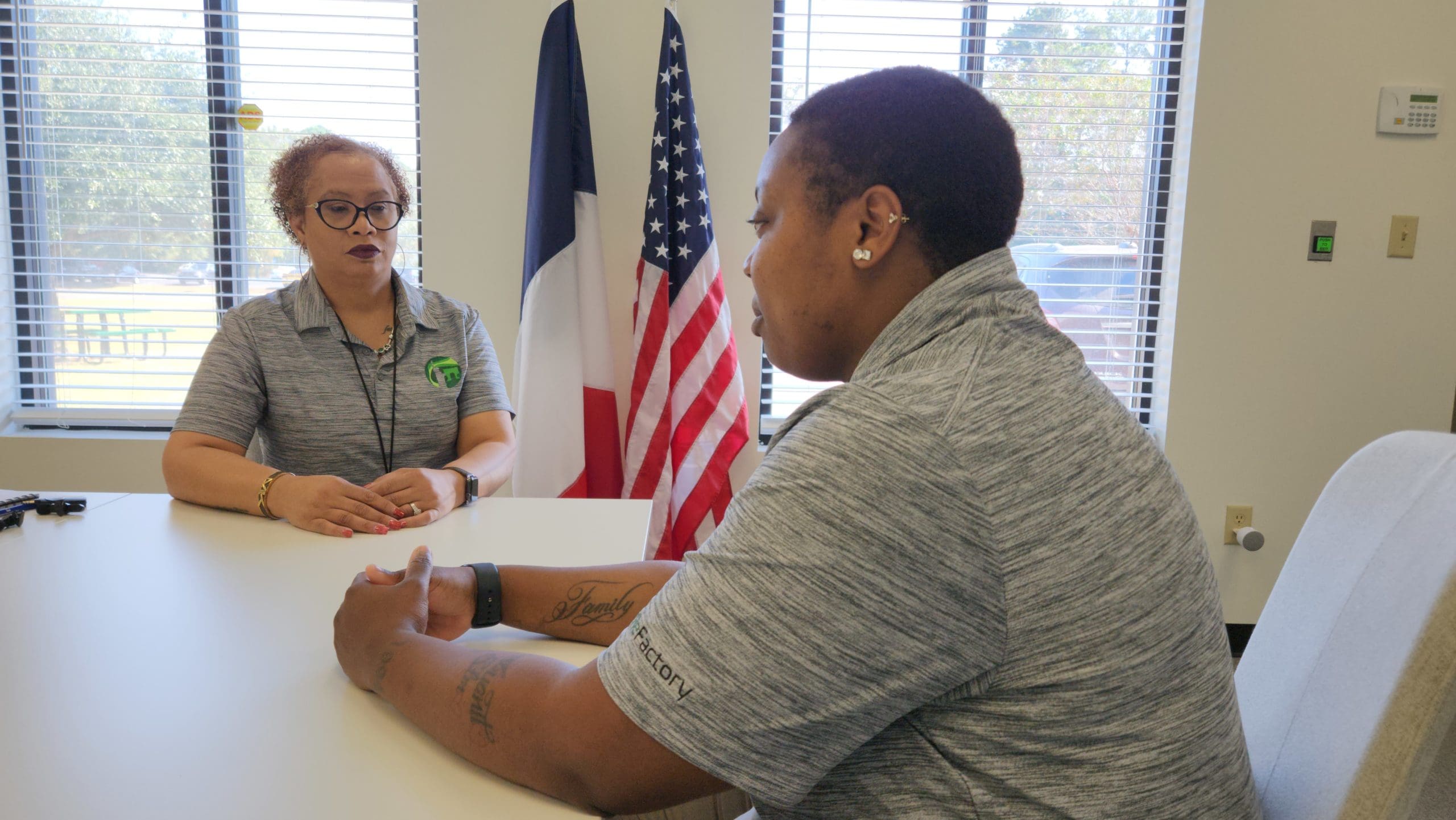 Tahitia talks with Kim Haynes, the ReFactory Site Manager.