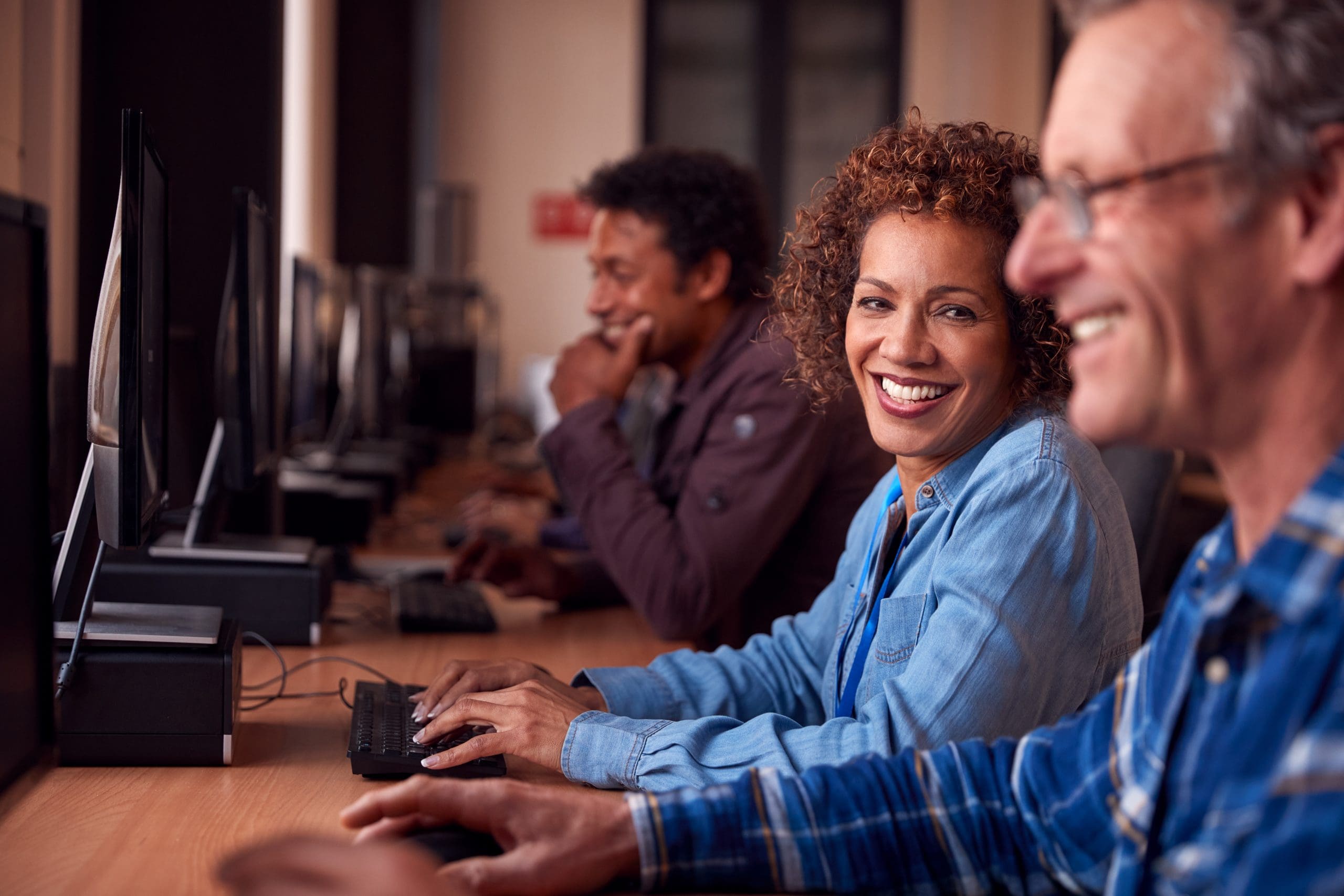Group,Of,Mature,Adult,Students,In,Class,Working,At,Computers