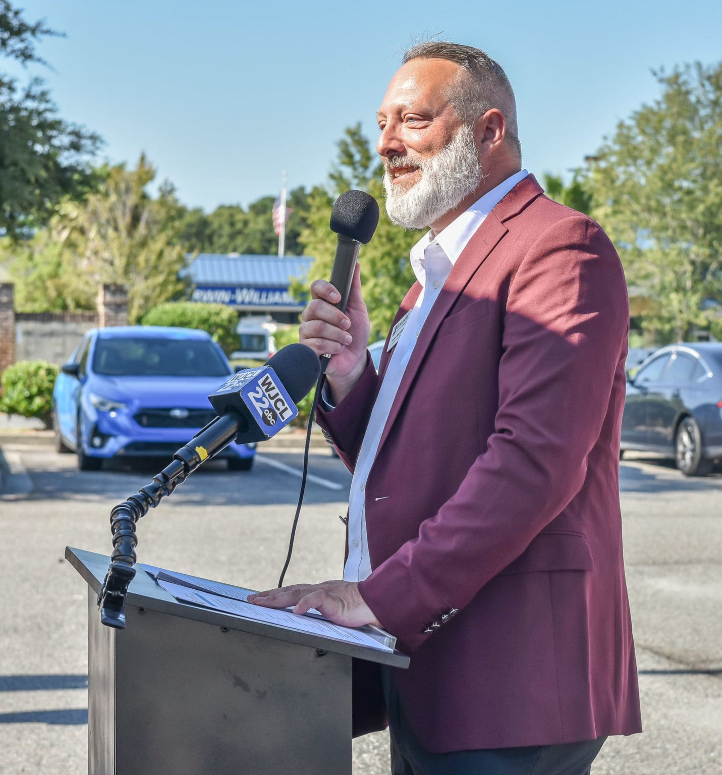Jason Marshall, President & CEO of Goodwill Southeast Georgia, speaks at the opening ceremony prior to the Pooler laptop distribution event. 