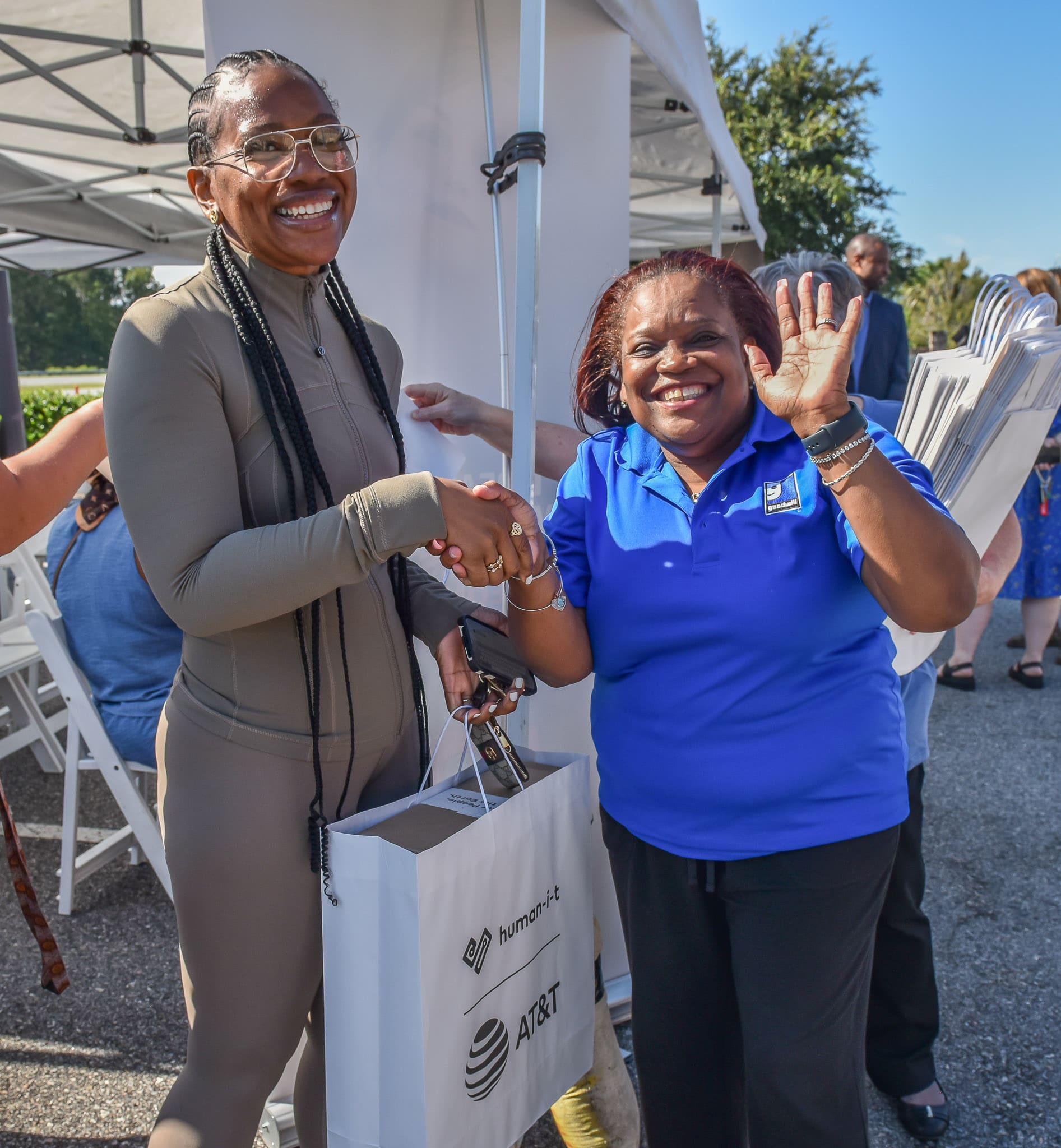 A participant smiles for a photo with Marie Champagne, Career Services Specialist at Goodwill Southeast Georgia.