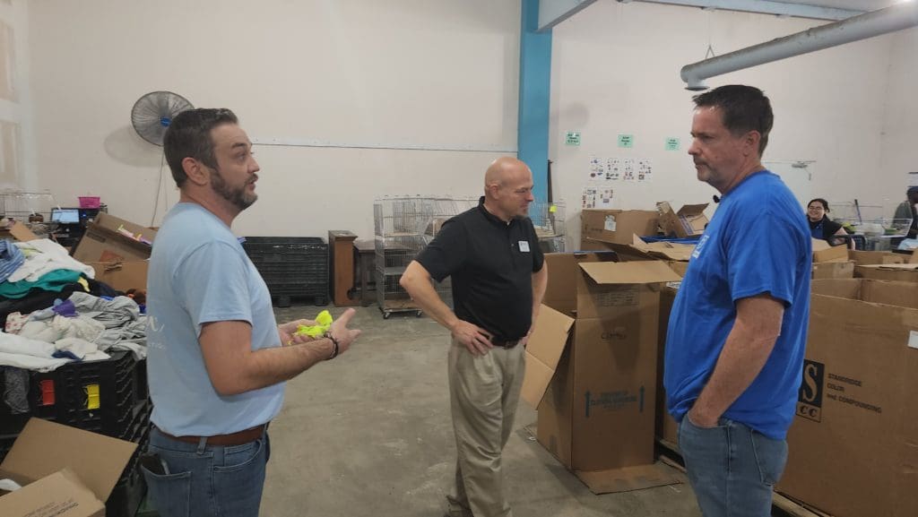 Shane and Terry host Todd on a back-of-house tour at Goodwill St. Mary's