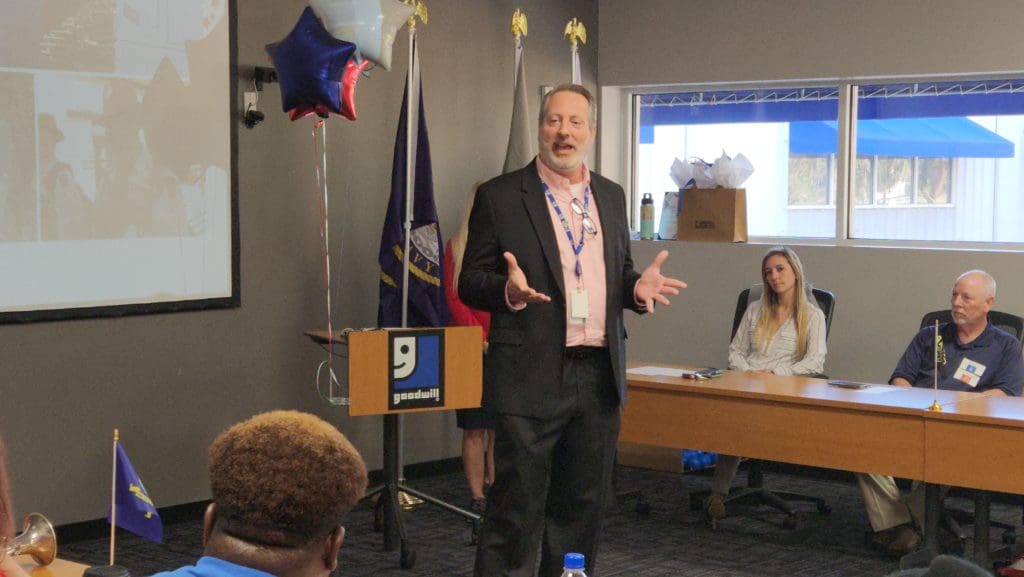 Jason Marshall, Chief Operating Officer, speaks to Goodwill veterans and Associates.