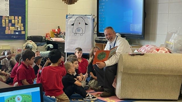 Jason Marshall, Interim President and CEO of Goodwill Southeast Georgia, reads to students at Springfield Elementary in Effingham County. 