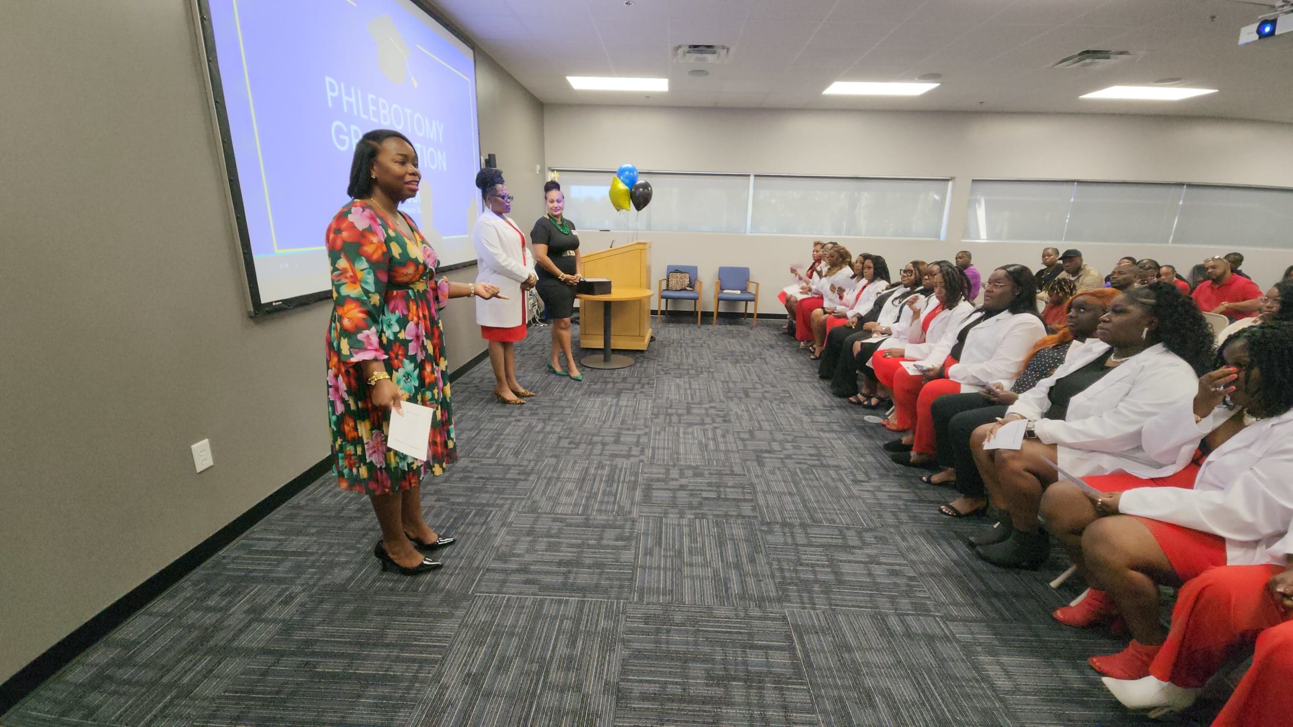 Danielle Irwin, Career Service Specialist at Goodwill's Savannah Opportunity Center, shares a message of congratulations and encouragement with the cohort.