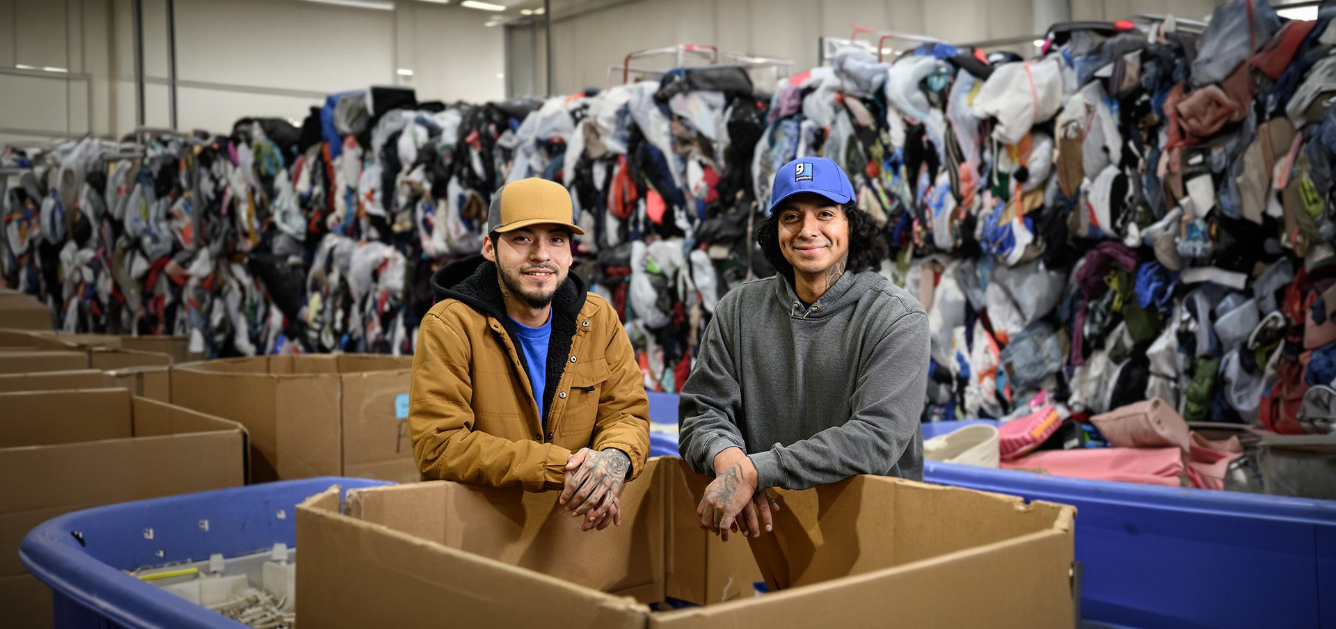 Goodwill employees by donation boxes