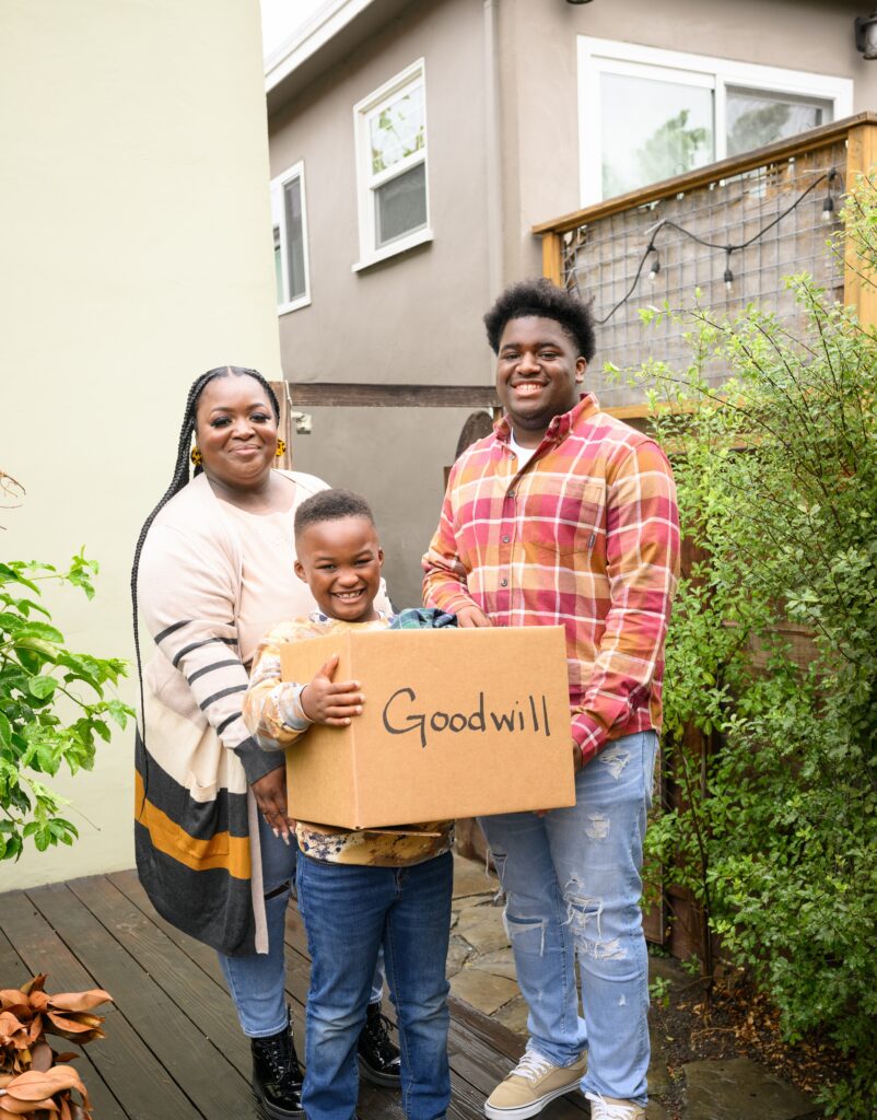 A family with a donation box