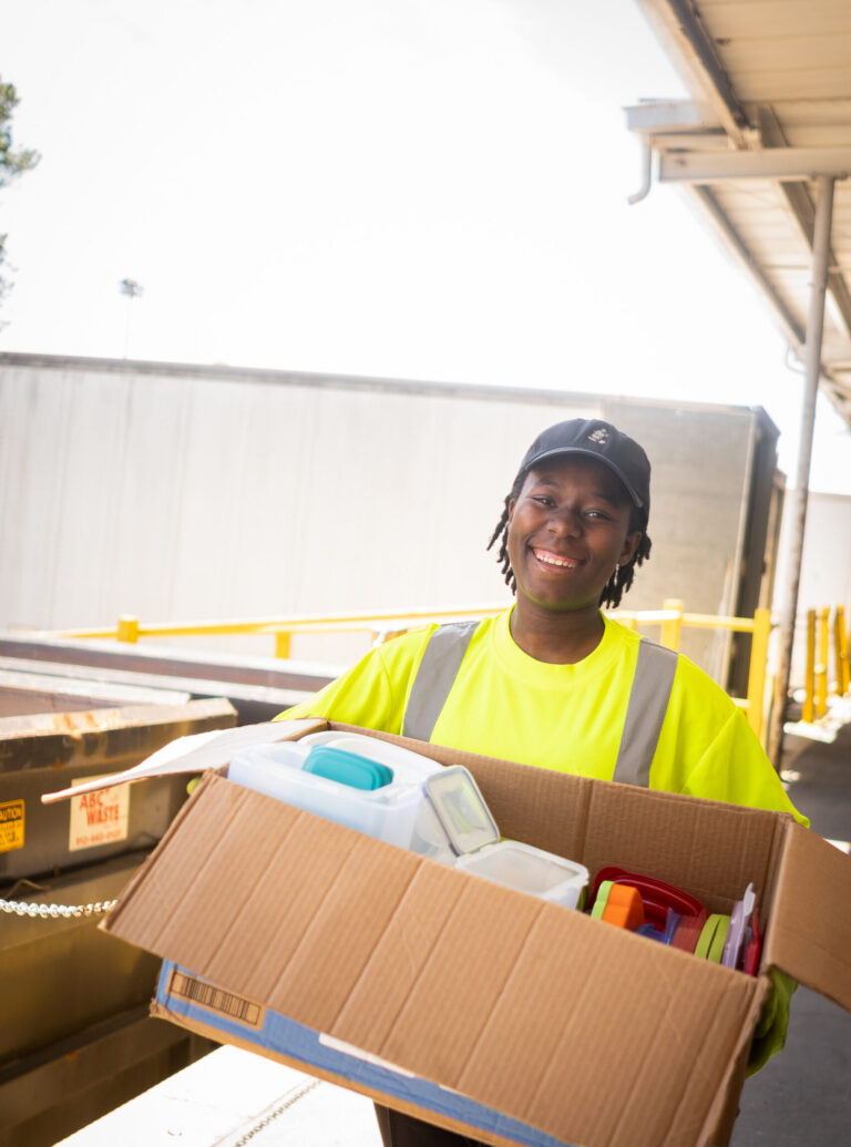 Goodwill employee handling donations