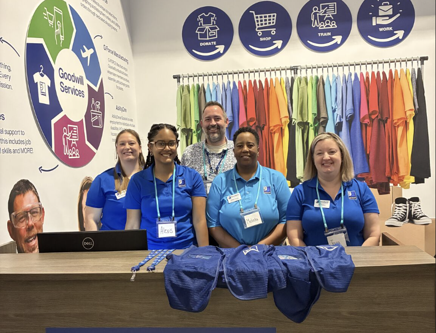 Goodwill employees smiling together